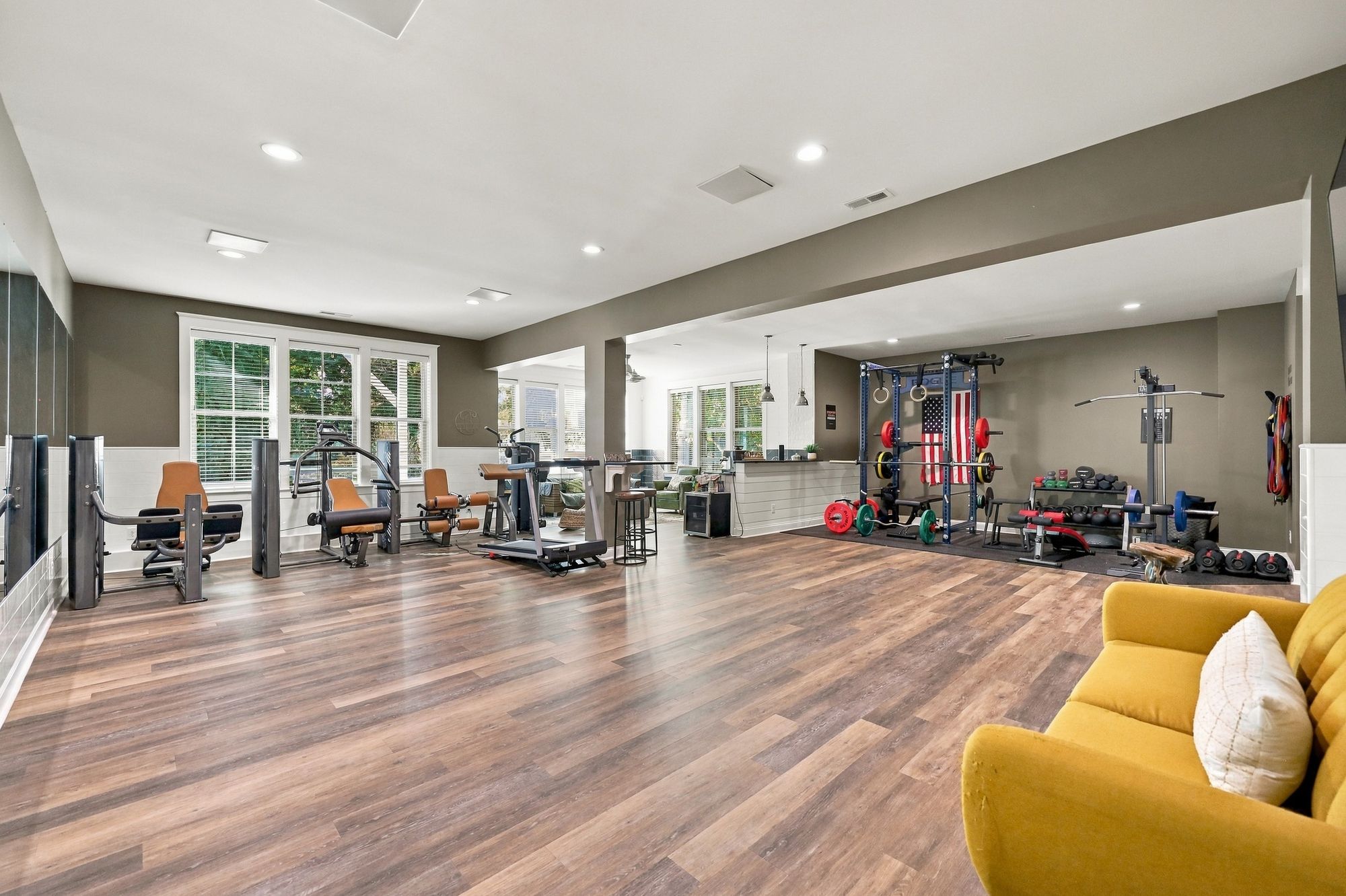 Full fitness center with walls of windows
